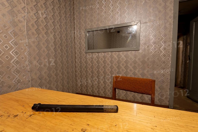 Interrogation room, rubber truncheon, former headquarters and prison of the Soviet secret service KGB, Riga, Latvia, Europe