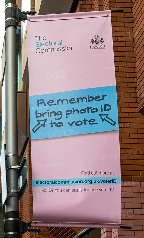 Electoral Commission banner about the need for photo ID to vote, Ipswich Borough Council, Ipswich, Suffolk, England, UK