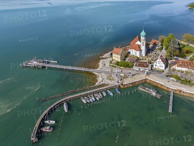 Moated castle peninsula with castle and parish church of St George on Lake Constance. Aerial view, moated castle, Bavaria, Germany, Europe