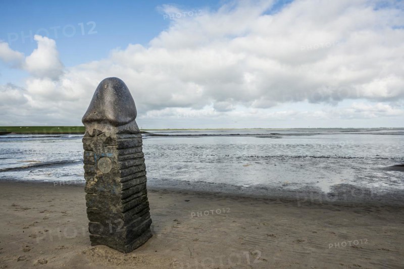 Stone sculpture on the beach and Wadden Sea, penis, artist Eckart Grenzer, Dangast, Jade Bay, North Sea, Lower Saxony, Germany, Europe