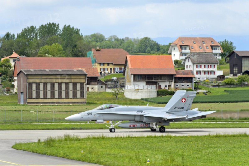 McDonnell Douglas FA 18C Hornet fighter aircraft of the Swiss Air Force taxied at Payerne military airfield, Payerne, Vaud, Switzerland, Europe