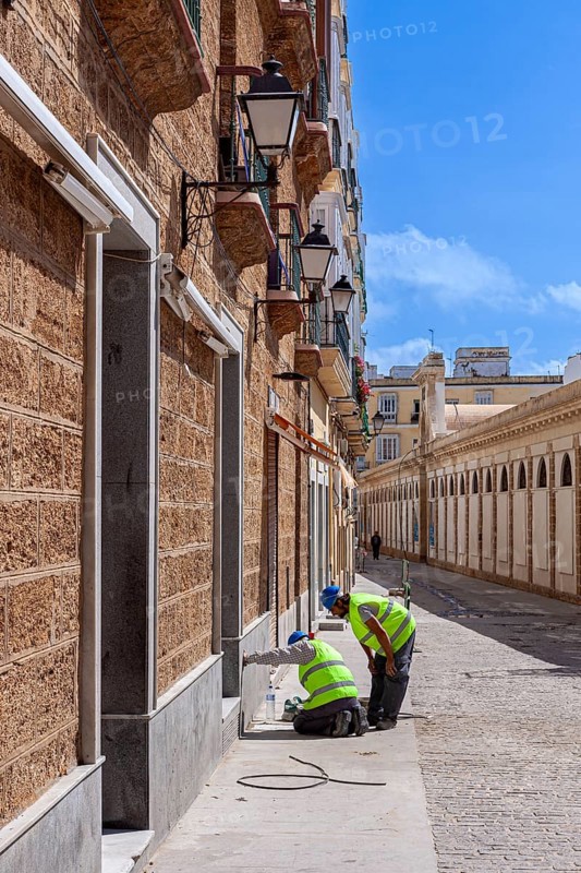Construction workers with yellow safety waistcoats, Cadiz, Andalusia, Spain, Europe
