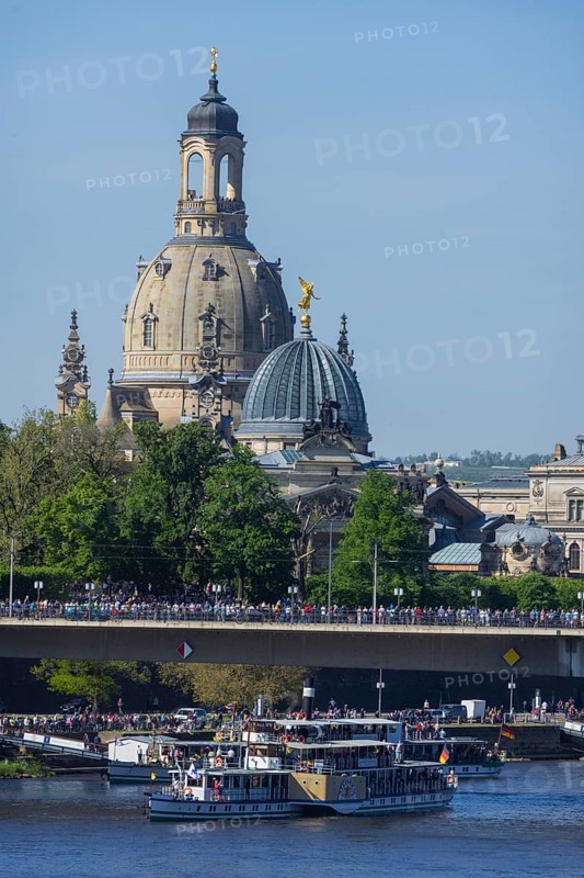 Every year on 1 May, the historic passenger steamers (PD) and the two saloon ships of the White Fleet form a decorated parade with live music on the ships. The banks and bridges of the Elbe are lined with thousands of spectators, Dresden, Saxony, Germany, Europe