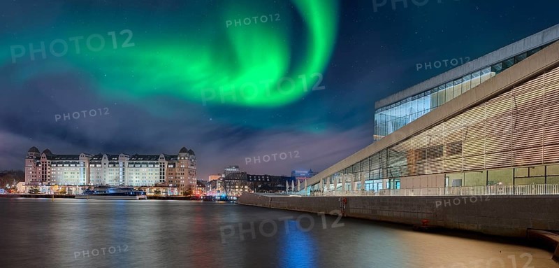 Opera and historic warehouse night Northern Lights Oslo Norway