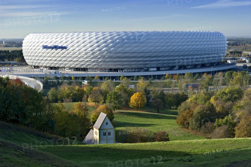 Allianz Arena, football stadium of FC Bayern Munich, copy of the Romanesque pilgrimage church of the Holy Cross, art object sunken village by Timm Ulrichs, art in architecture, Froettmaninger Berg, Froettmaning, Munich, Upper Bavaria, Bavaria, Germany, Europe