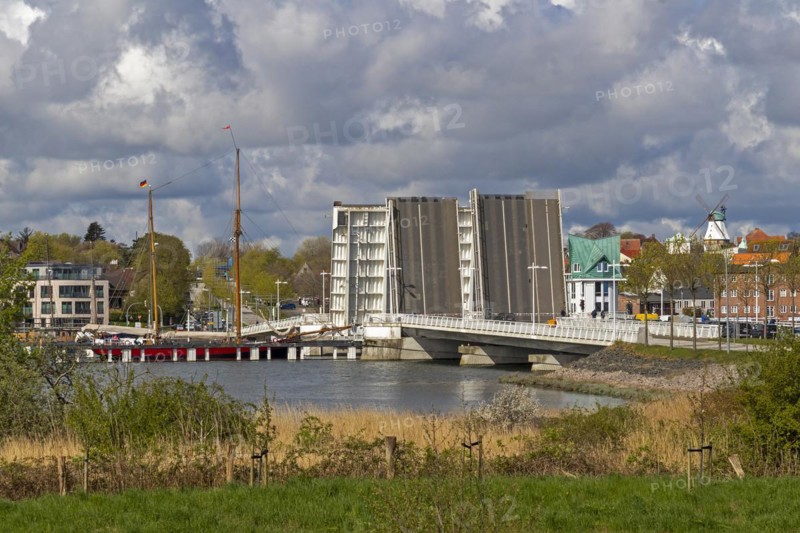 Sailing ship passes through open bascule bridge, Kappeln, Schlei, Schleswig-Holstein, Germany, Europe