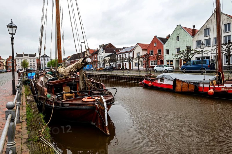 Old ships in the old harbour in the small town of Weener, at the back left historic Baerchen villa, Leer district, Rheiderland, East Frisia, Lower Saxony, Germany, Europe