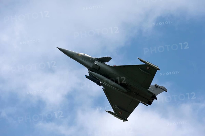 Silhouette of a Dassault Rafale B multi-role combat aircraft of the French Air Force Armee de l'Air in the air, Payerne military airfield, Vaud, Switzerland, Europe