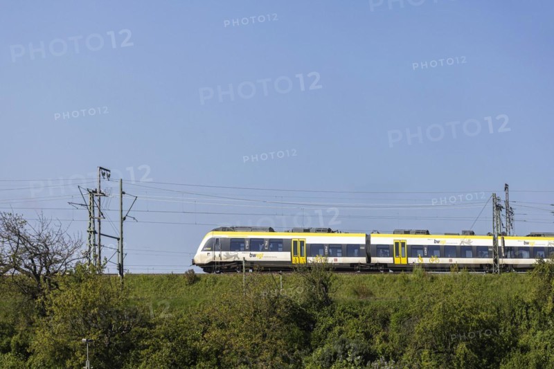 Regional train of the mobility brand bwegt unterwegs, railway embankment and overhead lines, infrastructure, Stuttgart, Baden-Wuerttemberg, Germany, Europe