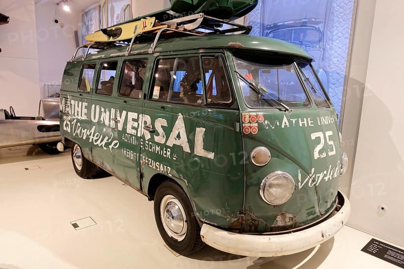 VW Transporter T1, retro Volkswagen bus with advertising lettering and roof luggage in a museum exhibition, AUTOMUSEUM PROTOTYP, Hamburg, Hanseatic City of Hamburg, Germany Europe