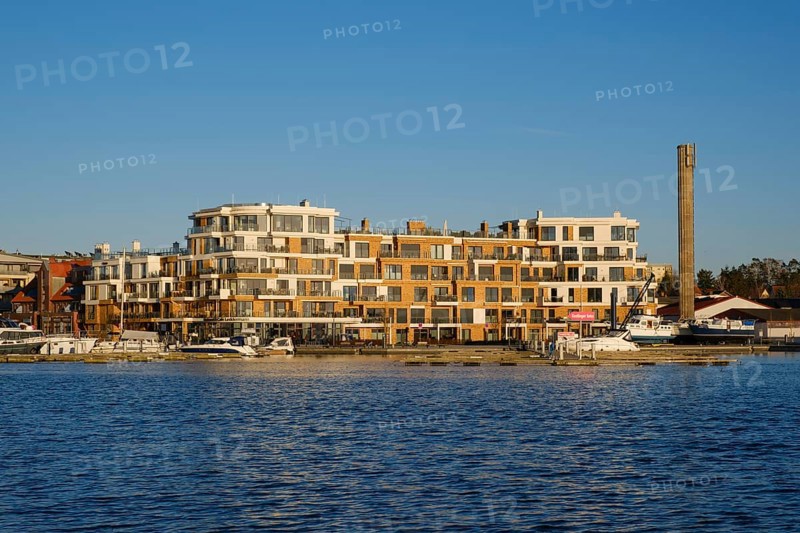 Modern apartment building on the harbour of Lake Mueritz, Waren, Mueritz, Mecklenburg Lake District, Mecklenburg, Mecklenburg-Vorpommern, Germany, Europe