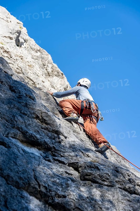 Sport climbing with rope, climber on a rock face, Frauenwasserl climbing garden, Ammergau Alps, Bavaria, Germany, Europe