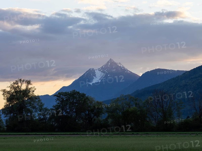 Evening clouds over mountain peak, Kammspitze, near Irdning, Ennstal, Styria, Austria, Europe