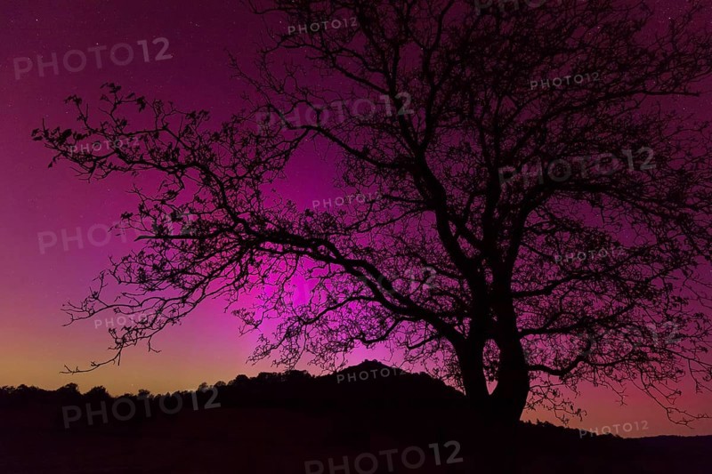 Northern lights in southern Germany. Very strong auroras over the Limburg near Weilheim, Swabian Alb. At 3 o'clock in the night on 11.05.2024