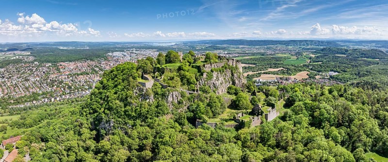 Aerial view, panorama of the volcanic cone Hohentwiel with Germany's largest fortress ruin, behind it the town of Singen am Hohentwiel, on the horizon the western part of Lake Constance, district of Constance, Baden-Wuerttemberg, Germany, Europe