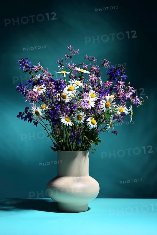 Vase with bouquet of wildflowers