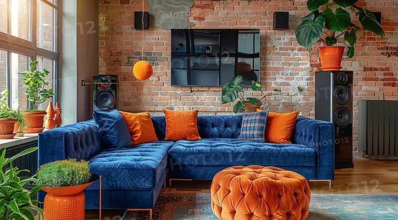 Modern living room in a condo or loft with modern trendy furniture a blue couch and orange pillows, AI generated