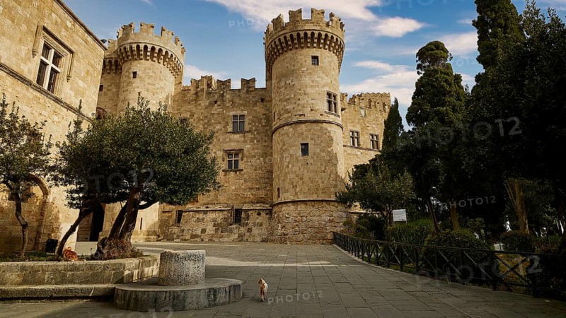 Super wide angle shot, Old castle with towers surrounded by trees under a clear blue sky, forecourt, Grand Master's Palace, Knights' Town, Rhodes Town, Rhodes, Dodecanese, Greek Islands, Greece, Europe