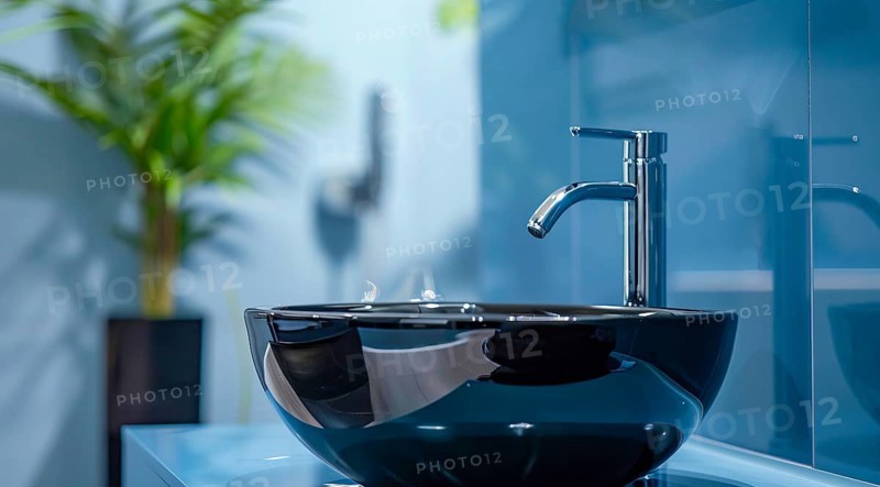A sink with a black bowl and a silver faucet in a modern luxury condo, AI generated