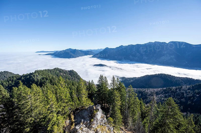 View from the summit of the Ettaler Manndl, view over mountain landscape and sea of clouds, high fog in the valley, Ammergau Alps, Bavaria, Germany, Europe