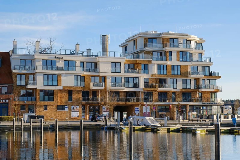 Modern apartment building on the harbour of Lake Mueritz, Waren, Mueritz, Mecklenburg Lake District, Mecklenburg, Mecklenburg-Vorpommern, Germany, Europe