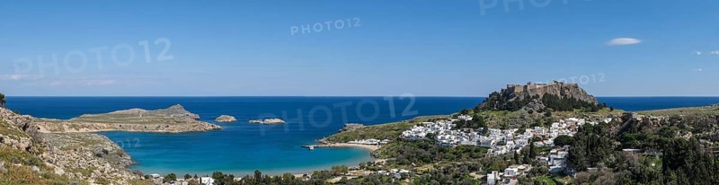 View of the Acropolis, Pallas Beach and the white houses of Lindos, Rhodes, Dodecanese archipelago, Greek Islands, Greece, Europe