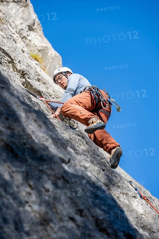 Sport climbing with rope, climber on a rock face, Frauenwasserl climbing garden, Ammergau Alps, Bavaria, Germany, Europe