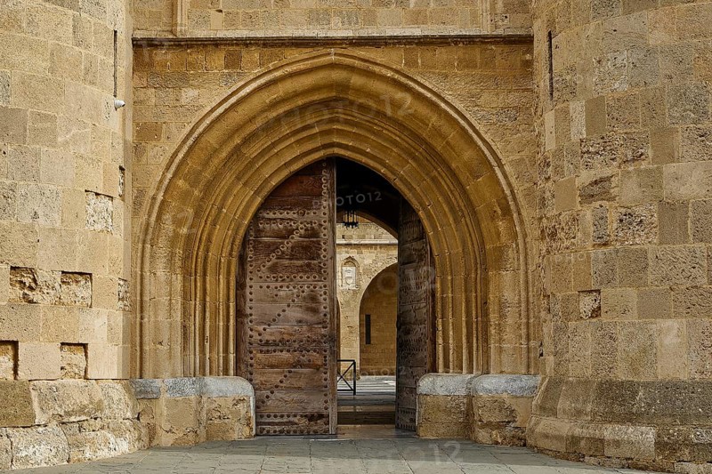 Large arched gateway on an old stone wall, main portal, Grand Master's Palace, Knights' Town, Rhodes Town, Rhodes, Dodecanese, Greek Islands, Greece, Europe