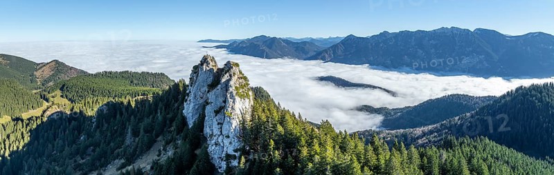Aerial view, rocky summit of the Ettaler Manndl, view over mountain landscape and sea of clouds, high fog in the valley, Ammergau Alps, Bavaria, Germany, Europe