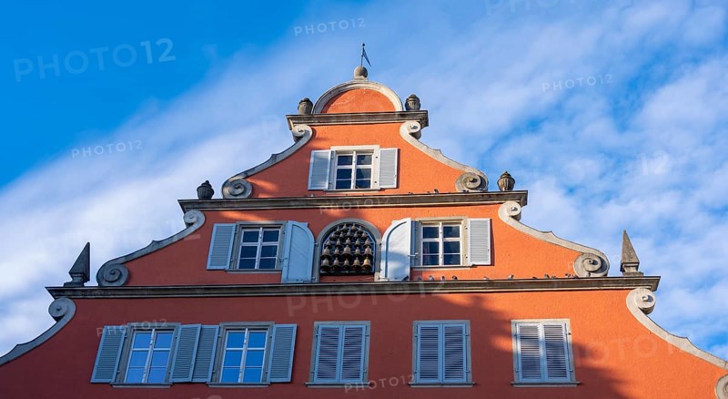Detail of the red facade of the New Town Hall with carillon, Lindau Island, Lake Constance, Bavaria, Germany, Europe