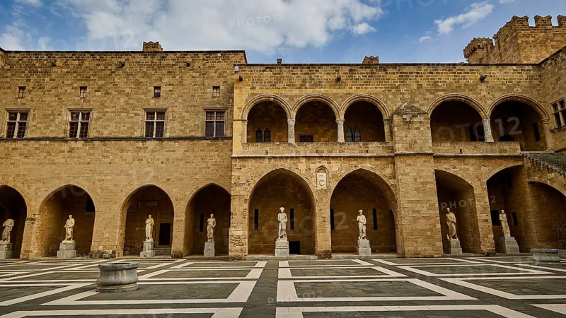Super wide angle shot, castle courtyard with arcades, statues and a chequered floor under a cloudy blue sky, courtyard, Grand Master's Palace, Knights' Town, Rhodes Town, Rhodes, Dodecanese, Greek Islands, Greece, Europe