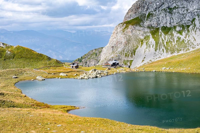Obstanserseehuette mountain hut on the Obstansersee mountain lake, Carnic main ridge, Carnic High Trail, Carnic Alps, Carinthia, Austria, Europe