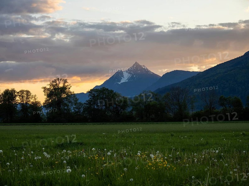 Evening clouds over mountain peak, Kammspitze, near Irdning, Ennstal, Styria, Austria, Europe