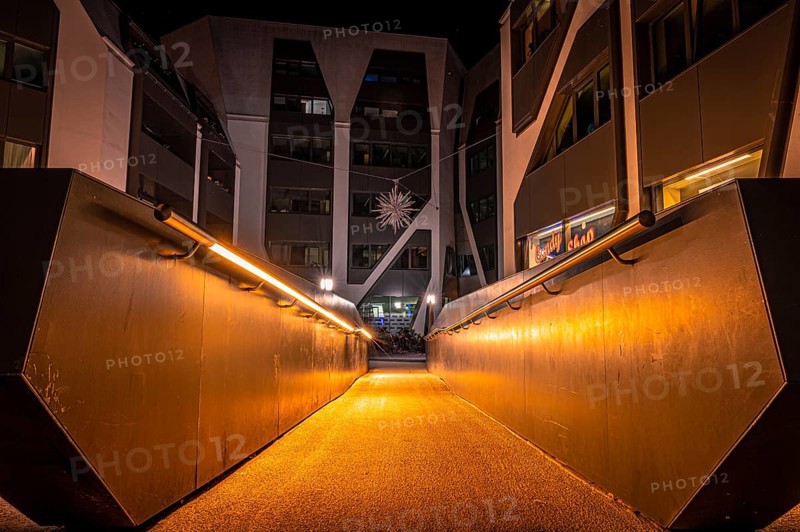 Inner courtyard of the futuristic building of the Carl Zeiss Jena WG in the city centre of Jena at night, Jena, Thuringia, Germany, Europe