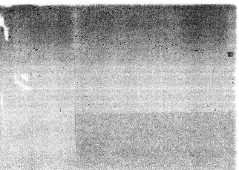 Dark grunge dirty photocopy grey paper texture useful as a background