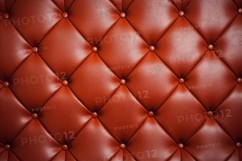 Red leather upholstery. KI generiert, generiert, AI generated