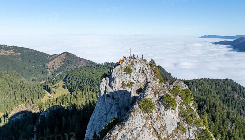 Aerial view, rocky summit of the Ettaler Manndl, view over mountain landscape and sea of clouds, high fog in the valley, Ammergau Alps, Bavaria, Germany, Europe