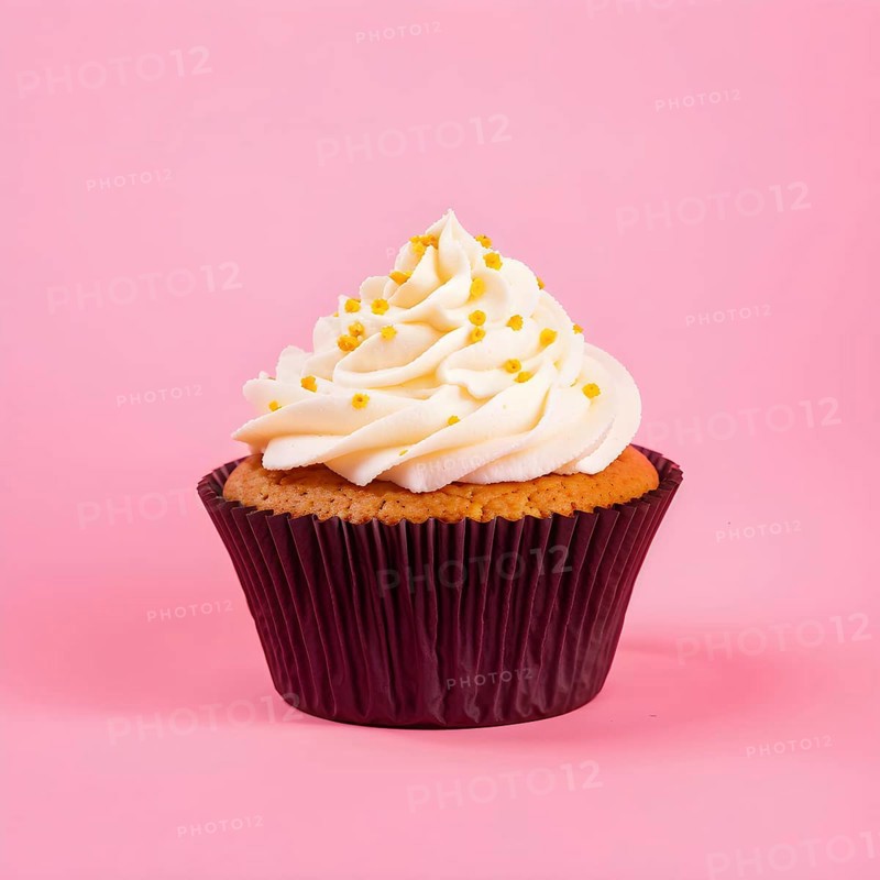 Cupcake with swirls of buttercream frosting in vanilla against pastel pink background, AI generated
