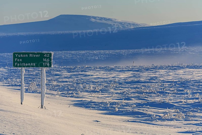 Road sign on the Dalton Highway in winter, Alaska, USA, North America