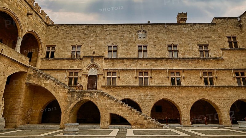 Courtyard of a castle with archways, columns and a stone staircase, sky replaced, courtyard, Grand Master's Palace, Knights' Town, Rhodes Town, Rhodes, Dodecanese, Greek Islands, Greece, Europe