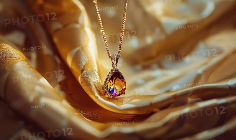 A stunning gemstone pendant suspended on a delicate chain against a backdrop of silky satin material AI generated