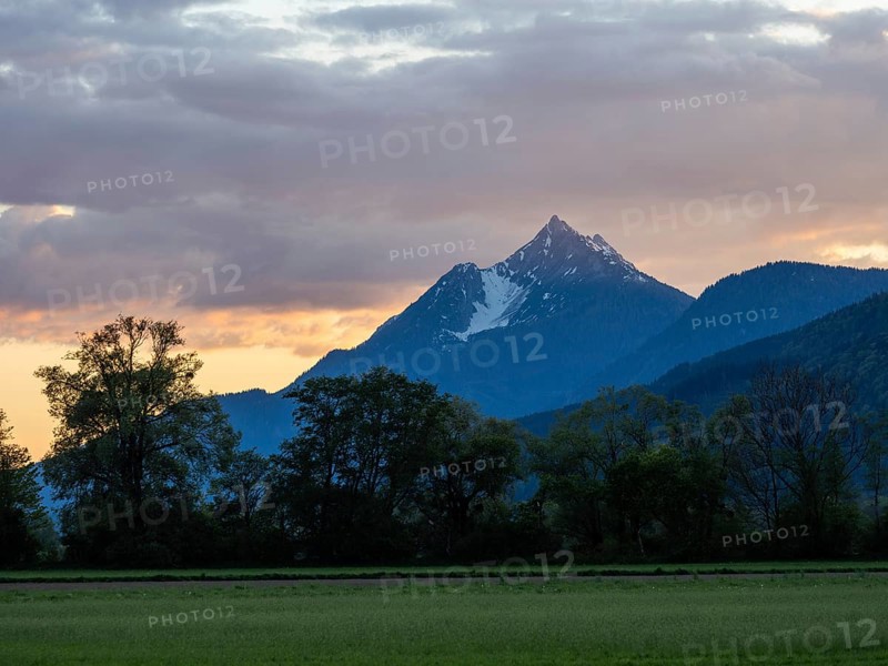 Evening clouds over mountain peak, Kammspitze, near Irdning, Ennstal, Styria, Austria, Europe