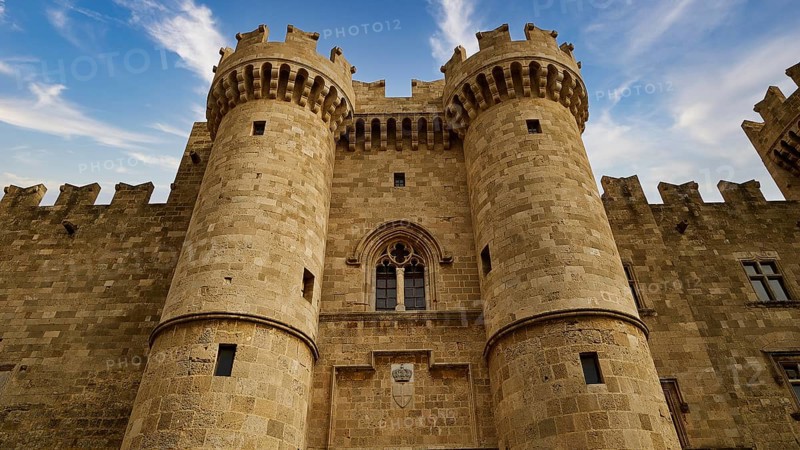 Detailed view of two tin towers of the castle in front of a cloudy sky, main portal, Grand Master's Palace, Knights' Town, Rhodes Town, Rhodes, Dodecanese, Greek Islands, Greece, Europe