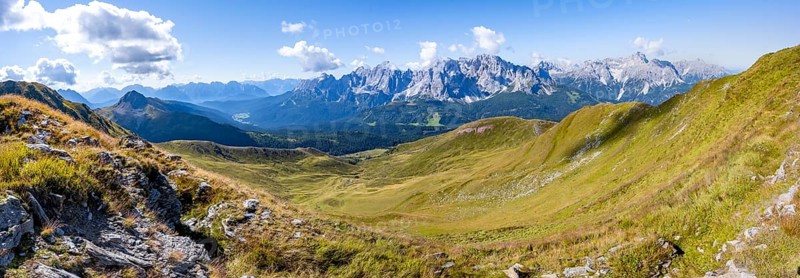 Green mountain meadows on a mountain ridge, mountain panorama, view of rocky mountain peaks of the Sesto Dolomites, Carnic main ridge, Carnic High Trail, Carnic Alps, Carinthia, Austria, Europe