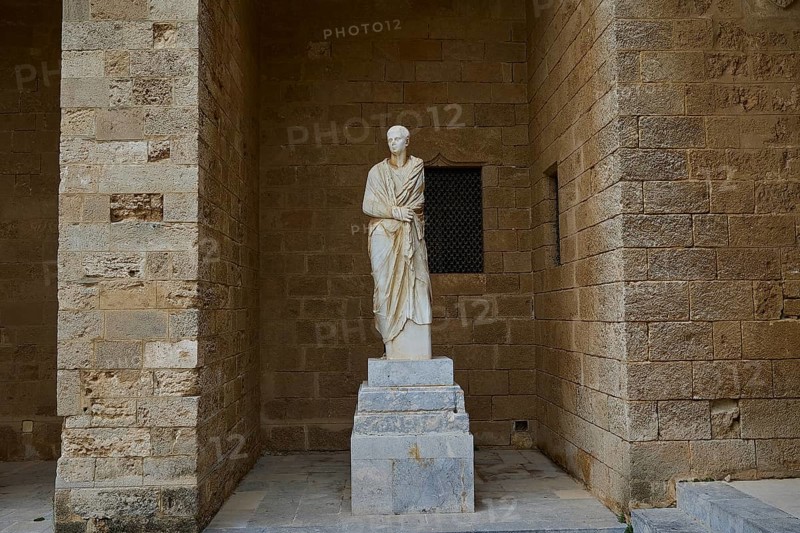 Antique statue of a character in traditional garb on a pedestal, torso from Rhodes, marble head from the island of Kos from the 1st century BC, courtyard, Grand Master's Palace, Knights' Town, Rhodes Town, Rhodes, Dodecanese, Greek Islands, Greece, Europe