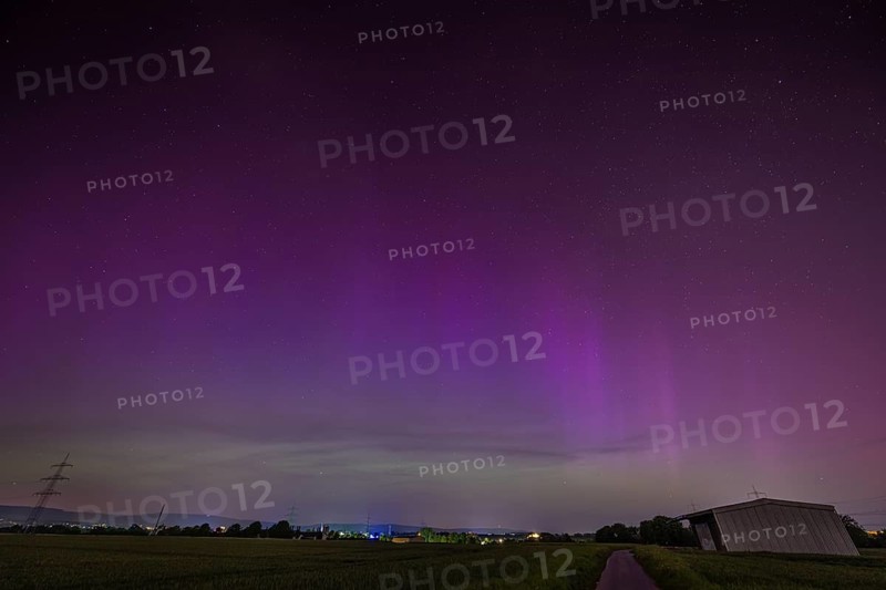 After several solar storms (solar flares), so-called auroras can be seen in the sky throughout Germany in the night between 10 May 2024 and 11 May 2024. The natural spectacle could be observed here in Hesse over the Taunus ridge, Frankfurt am Main, Hesse, Germany, Europe