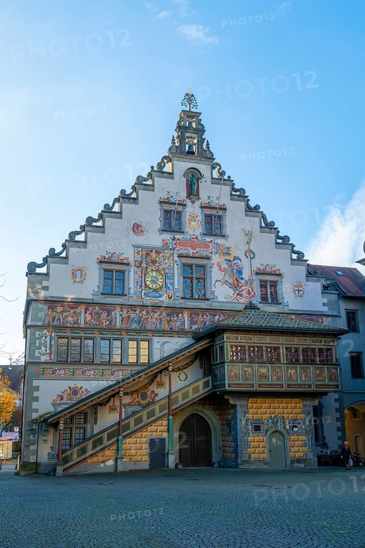 Detailed view of a historic building with frescoes and a bay window under a clear blue sky, Lindau Island, Lake Constance, Bavaria, Germany, Europe