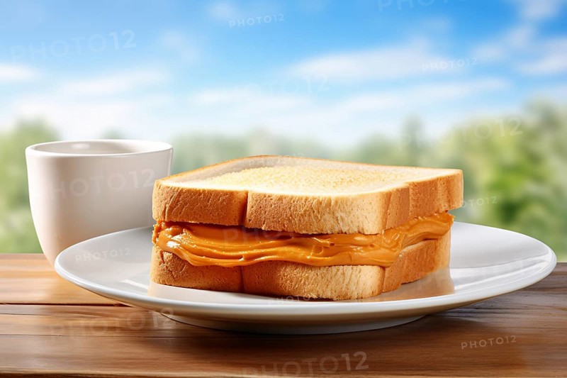 Peanut butter sandwich on plate with blurry nature background. KI generiert, generiert, AI generated