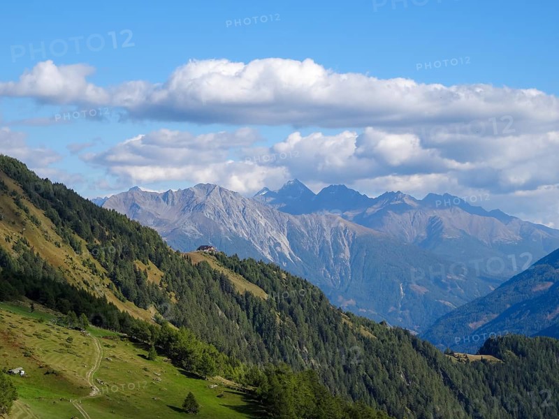 View over the Bodenalm in Virgental and across the Matreier Tauerntal to the peaks of the Hohe Tauern, East Tyrol, Austria, Europe