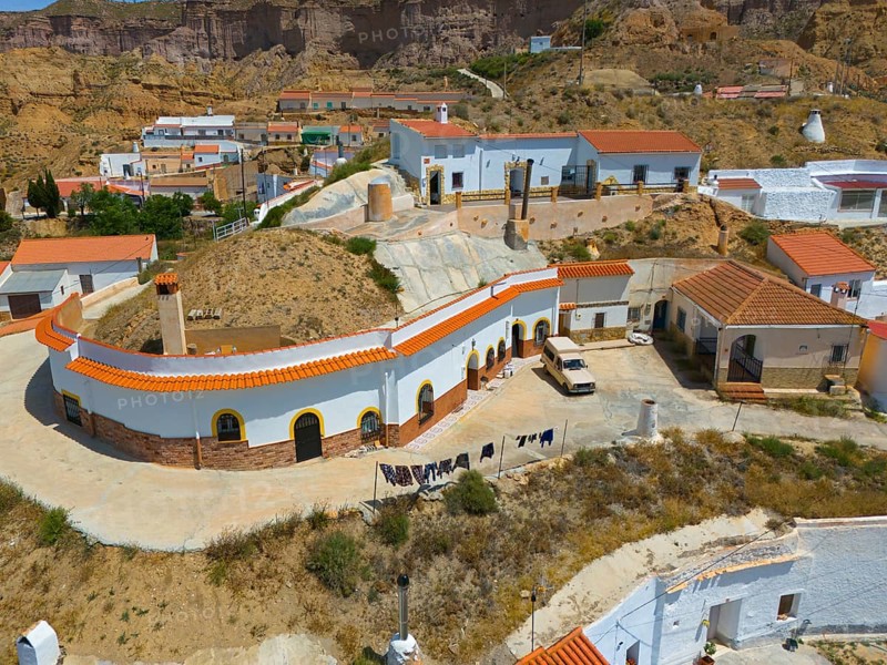 View of a Spanish village in a dry environment with white and orange houses, aerial view, cave dwellings, Gorafe, Guadix, Granada, Andalusia, Spain, Europe